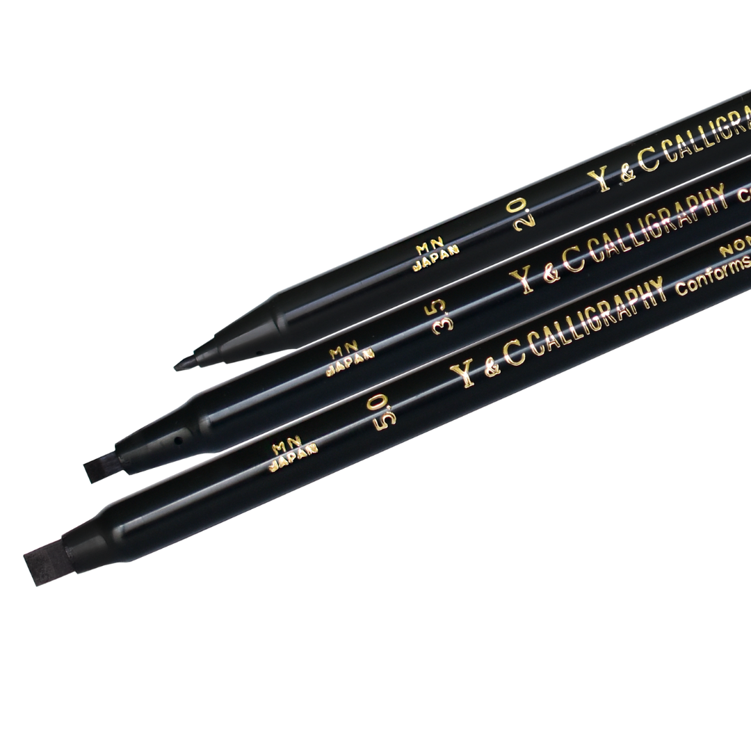 close up picture of three different sized calligraphy markers