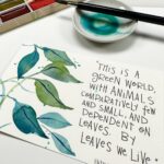 watercolor leaves with a Patrick Geddes quote "This is a green world, with animals comparatively few and small, and dependent on leaves. By leaves we will." with a gansai watercolor set, porcelain dish and paintbrush around it