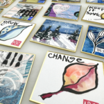 assortment of square shikishi boards with paintings and mixed media of leaves, trees, and abstract designs