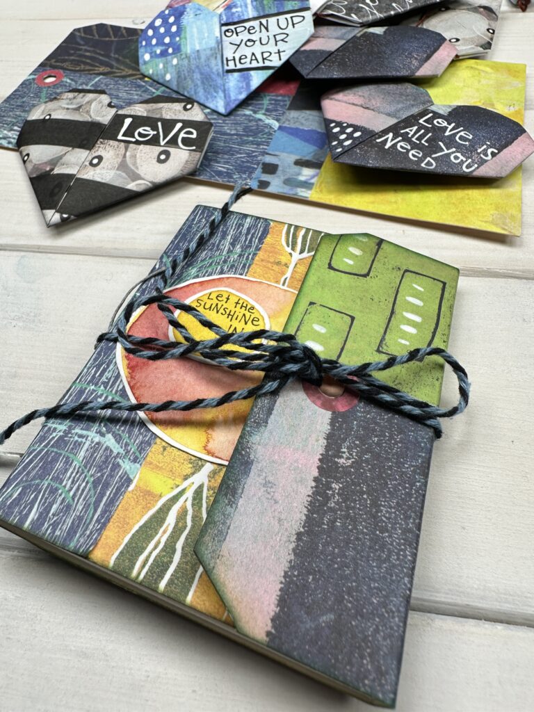 tag books and origami hearts made with painted papers origami paper
