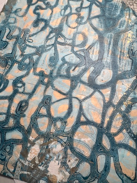 close up picture of blue abstract scribbles gel print on washi paper