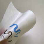 close up of gampi paper catching the light