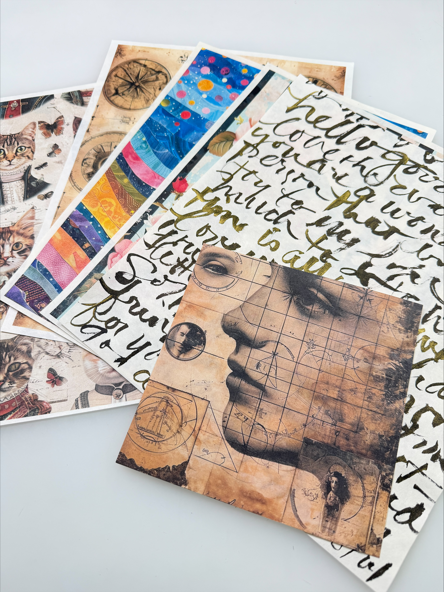 assorted colorful prints and paintings arranged in a spread