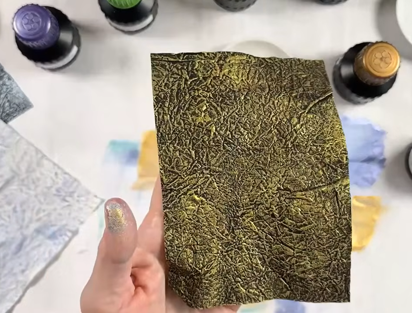 momigami made with black washi paper and painted with metallic gold ink