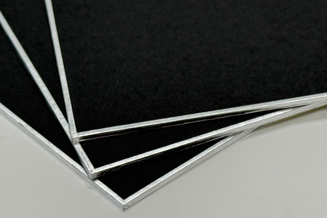 close up shot of three black shikishi board corners