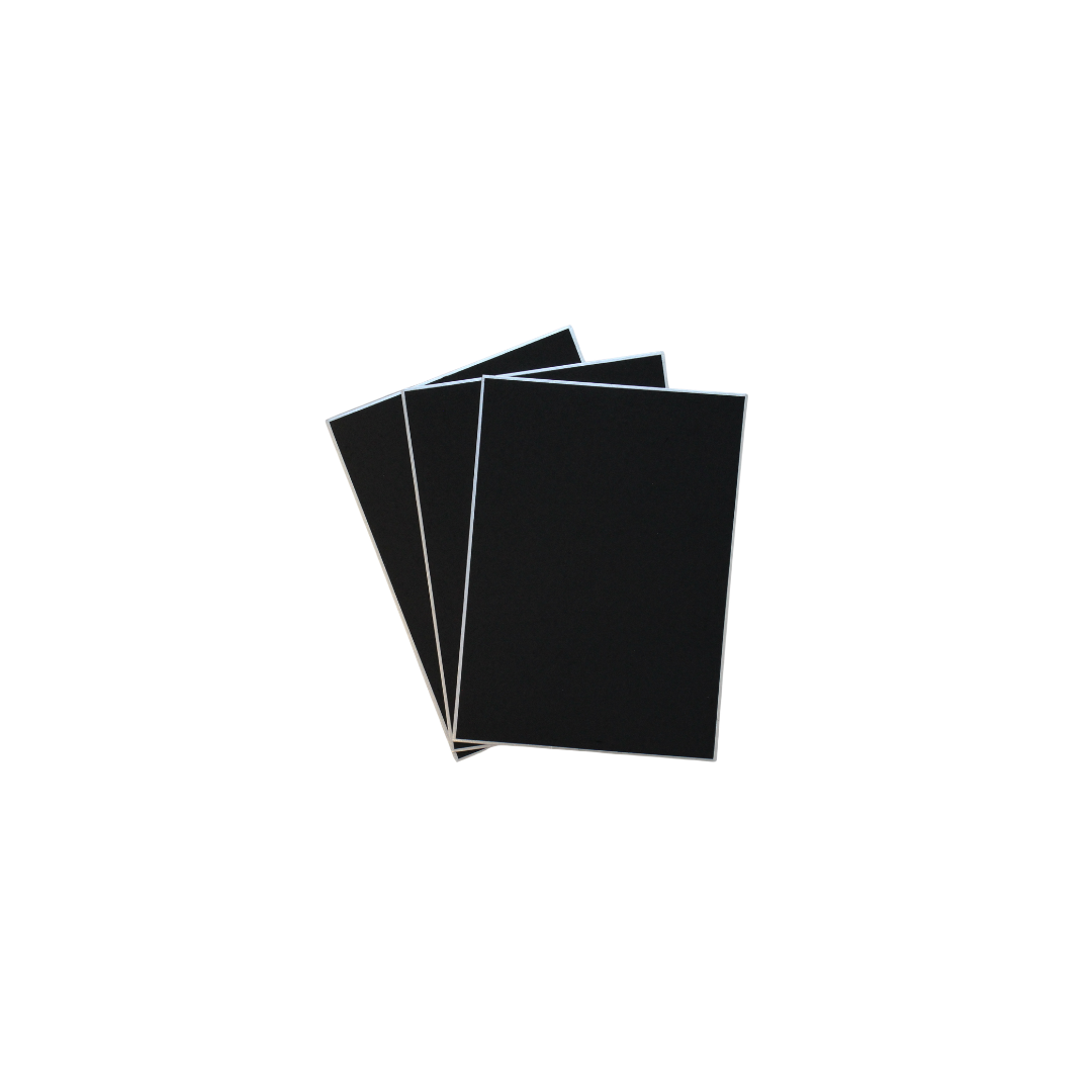 three rectangular black shikishi boards with silver foil edges fanned out